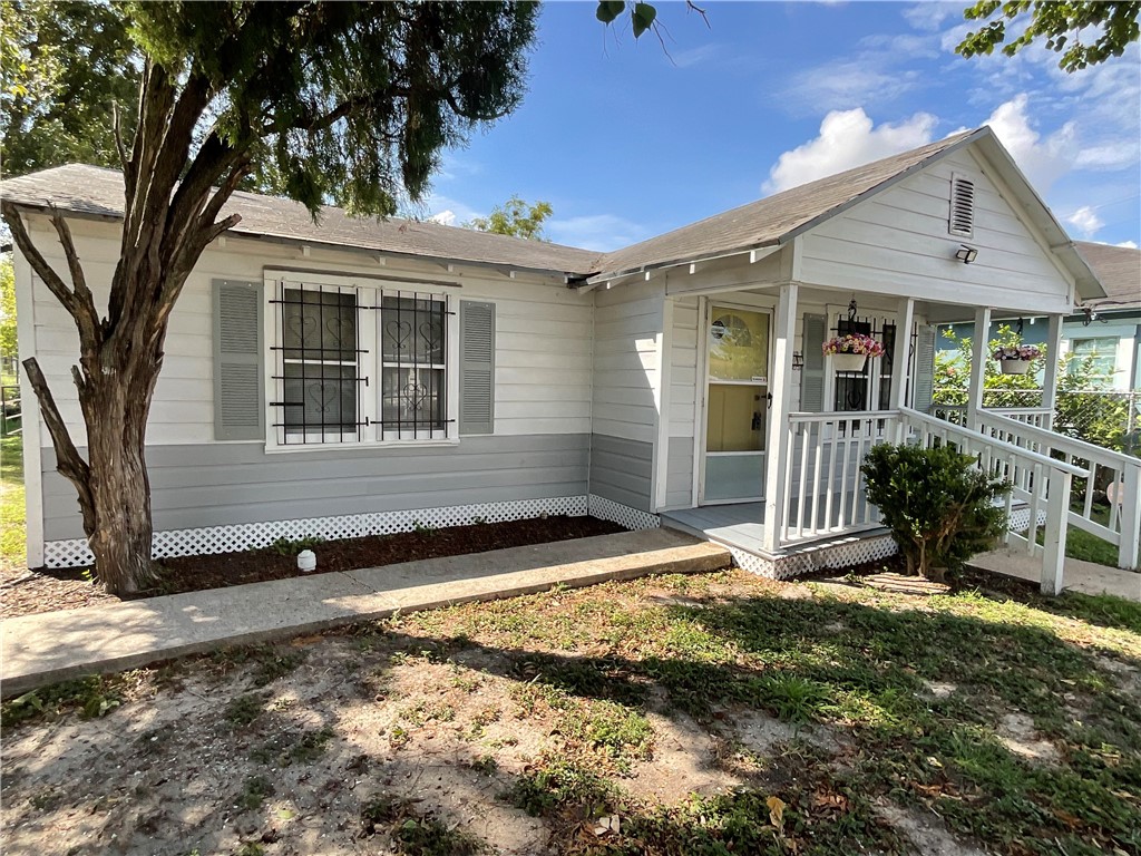 2507 Morris Street Corpus Christi, TX 78405 - Photo 15 of 16 a front view of a house with a yard