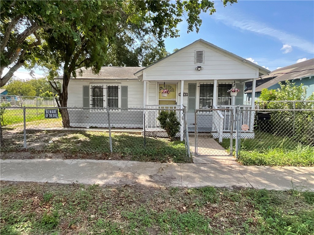 2507 Morris Street Corpus Christi, TX 78405 - Photo 16 of 16 a front view of a house with garden