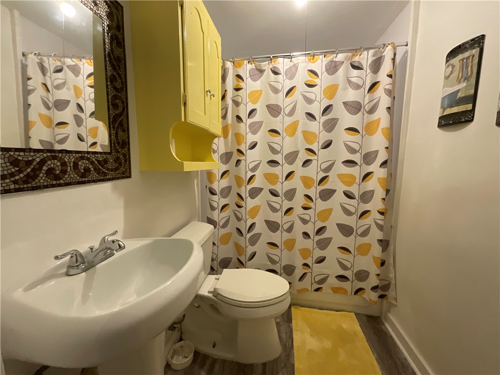 2507 Morris Street Corpus Christi, TX 78405 - Photo 10 of 16 a bathroom with a sink and a mirror