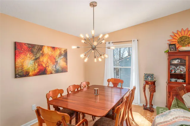 a kitchen with granite countertop stainless steel appliances a sink and counter space