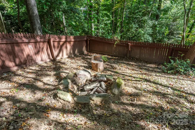 a view of a house with a tree