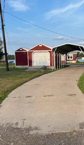 a view of swimming pool from a lake view