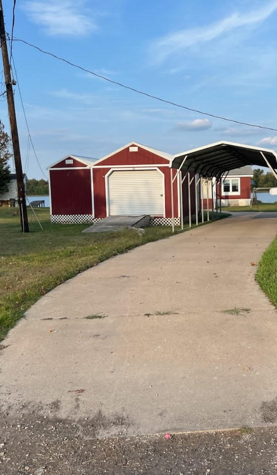 12 Walnut Bend Huntsville, TX 77320 - Photo 14 of 16 a front view of a house with garden