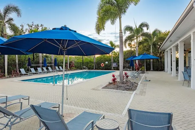 an aerial view of house with yard