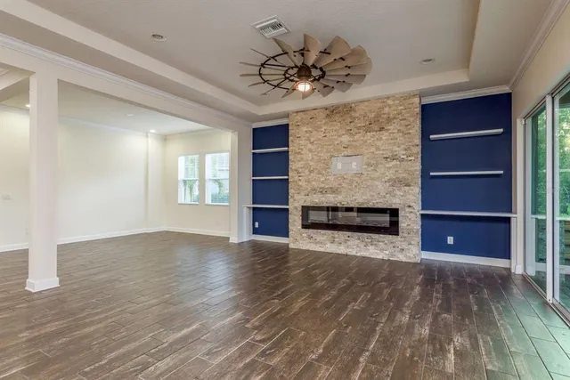 a view of kitchen with refrigerator and window