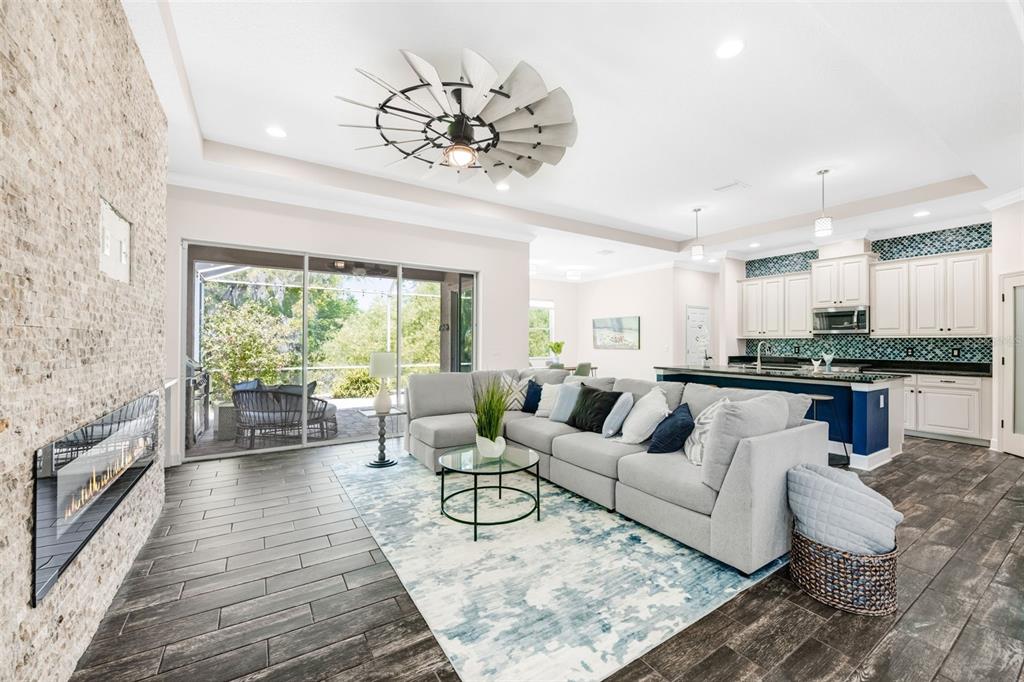 5116 Coastal Scene Drive Apollo Beach, FL 33572 - Photo 6 of 36 a living room with furniture and a large window