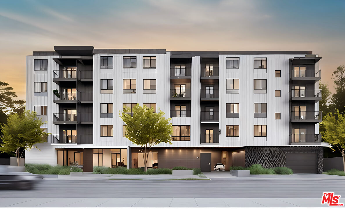 12335 Osborne Place Pacoima, CA 91331 - Photo 2 of 2 a front view of building with a garden