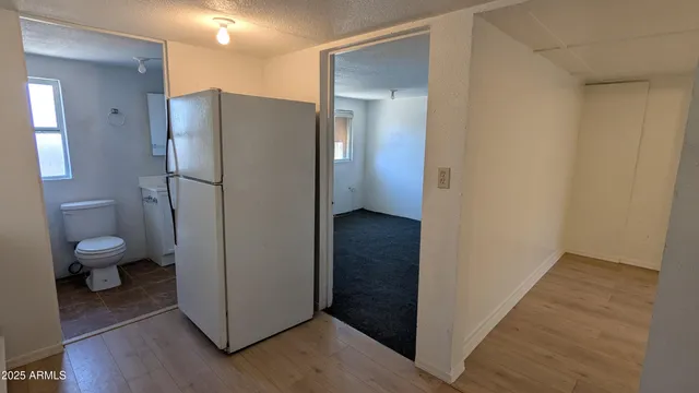 a bathroom view of a toilet and a sink