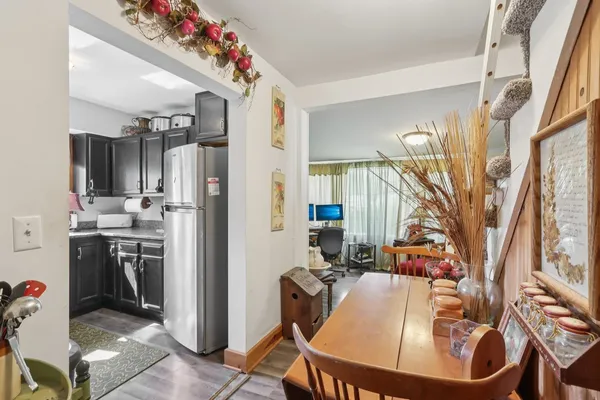 a kitchen with a stove a sink and a microwave