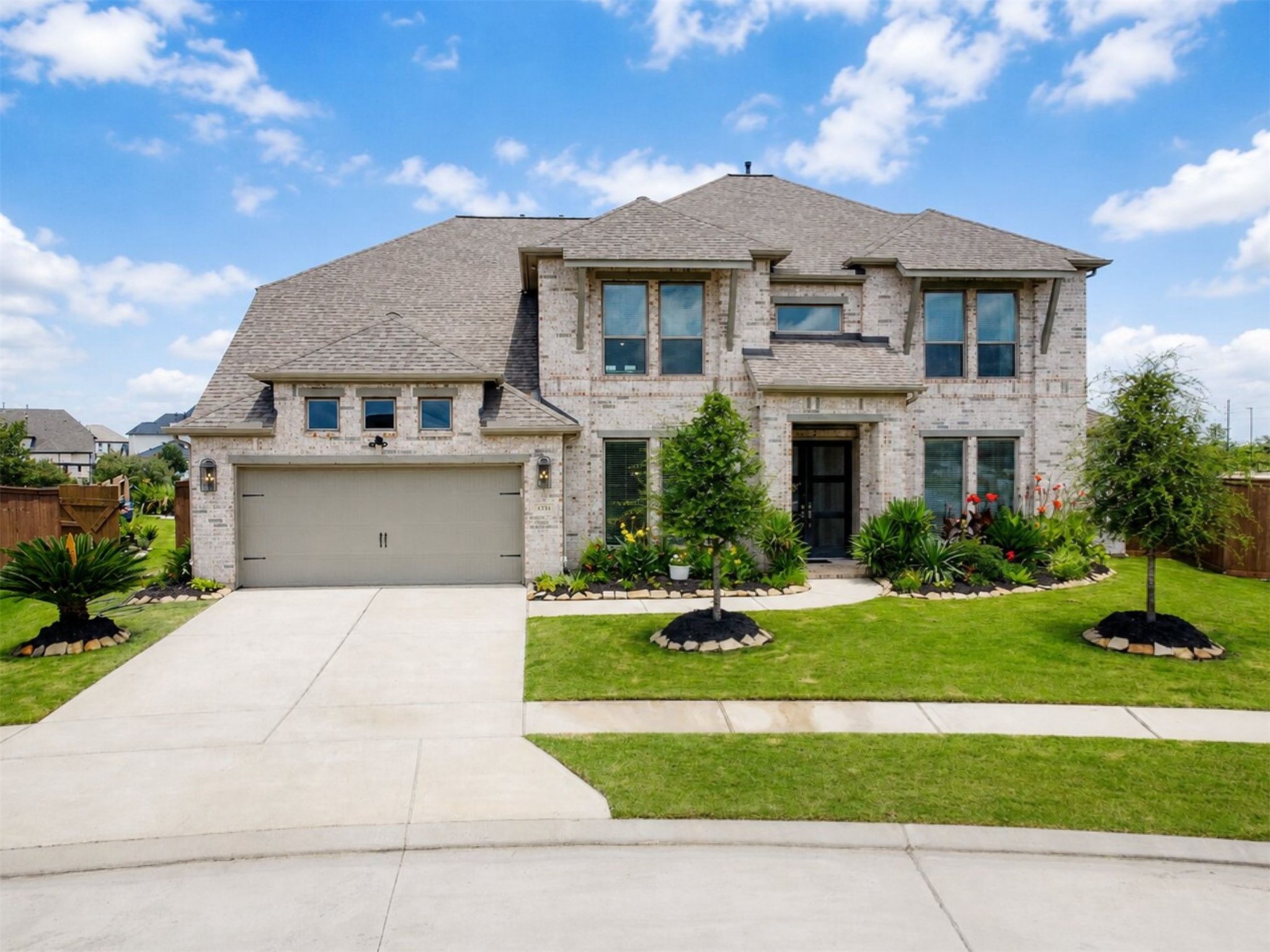 4343 Martin Ridge Drive Manvel, TX 77578 - Photo 3 of 50 a front view of a house with a yard