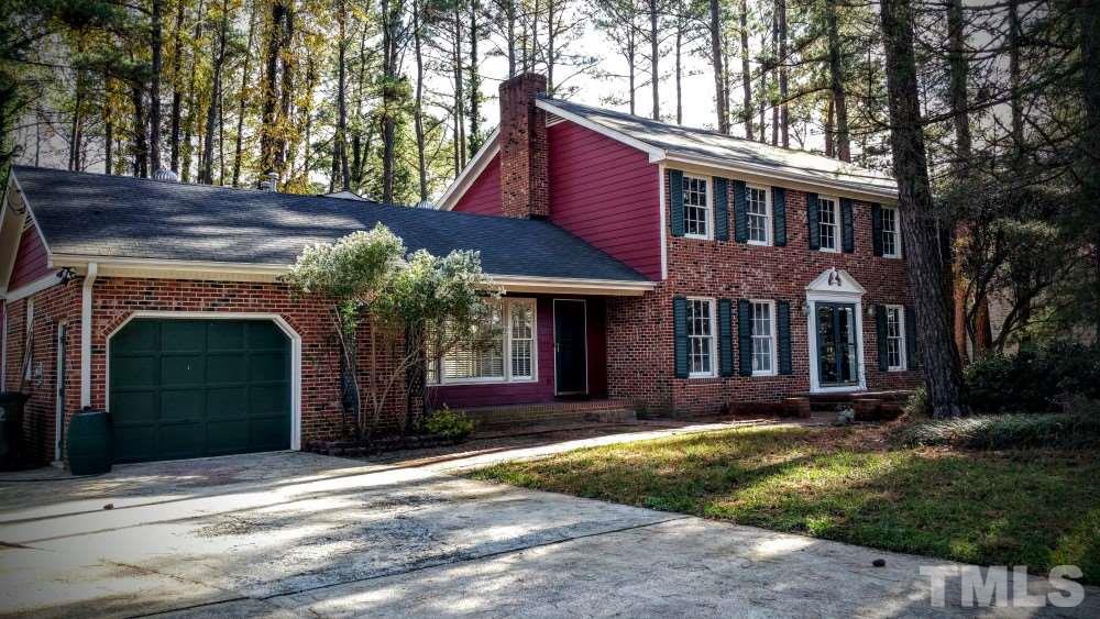 3805 Oak Park Road Raleigh, NC 27612 - Photo 1 of 20 a front view of a house with yard