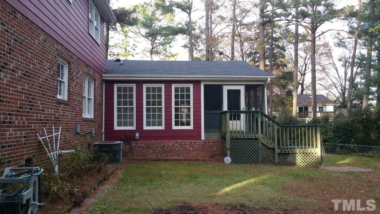 3805 Oak Park Road Raleigh, NC 27612 - Photo 19 of 20 a view of front of a house with a yard