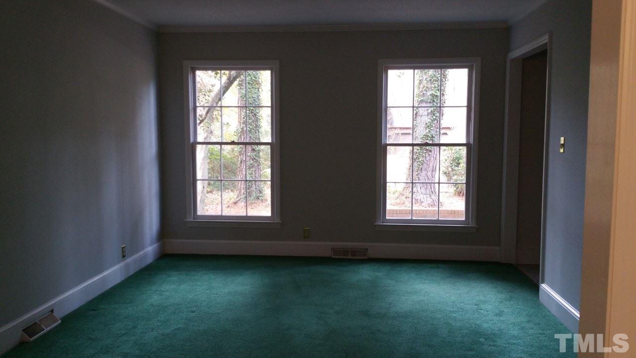 3805 Oak Park Road Raleigh, NC 27612 - Photo 8 of 20 an empty room with a window