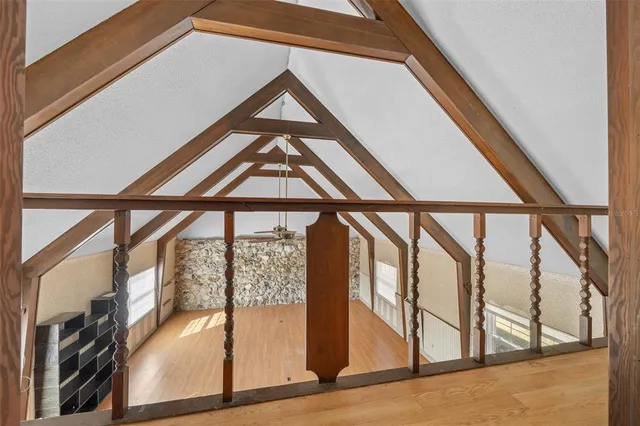 a view of parking garage with cars