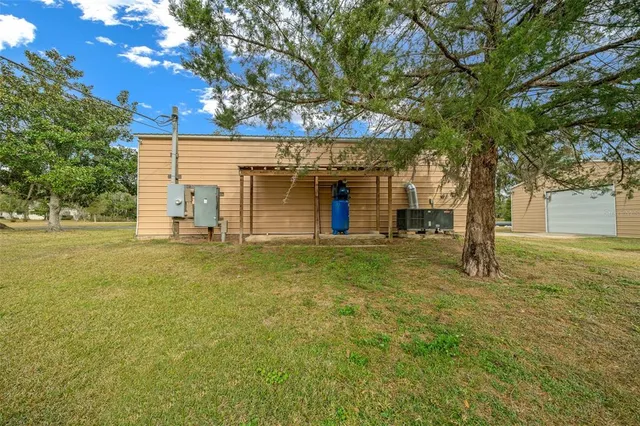 a view of a house with a swimming pool