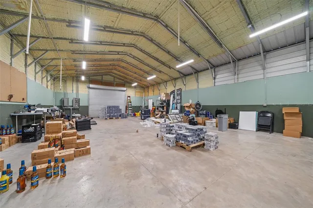 a kitchen that has a sink and a large window