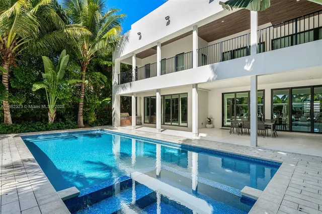 a view of a building with a sitting area