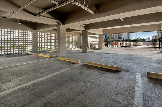 a view of a hall with wooden floor
