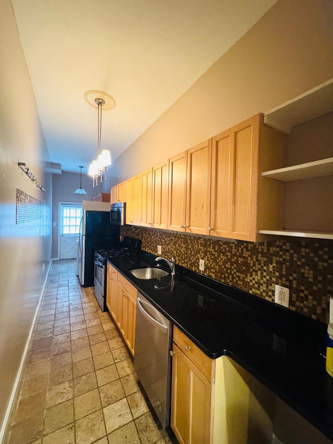 310 3rd Street Southeast Washington, DC 20003 - Photo 6 of 11 Kitchen to Rear patio