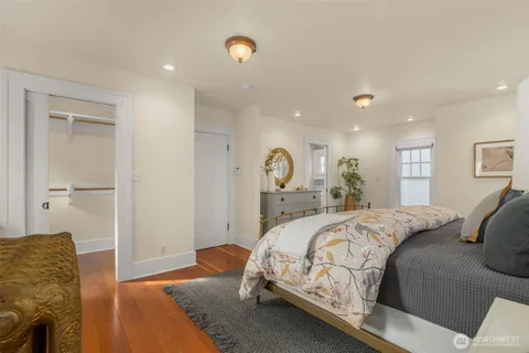 a bed room with a bed and a couch