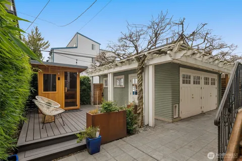 a view of a house with porch and wooden floor