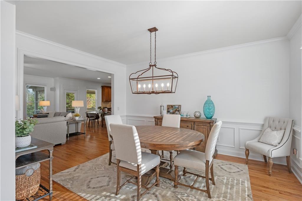 5740 Cascade Trail Cumming, GA 30040 - Photo 10 of 64 a view of a dining room with furniture
