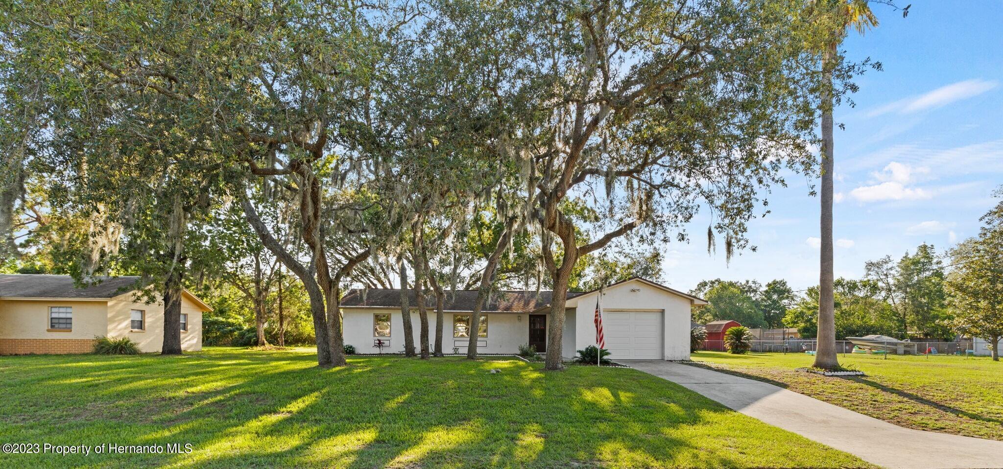 129 Candlewick Avenue Spring Hill, FL 34608 - Photo 1 of 28 2 cropped front of house 129
