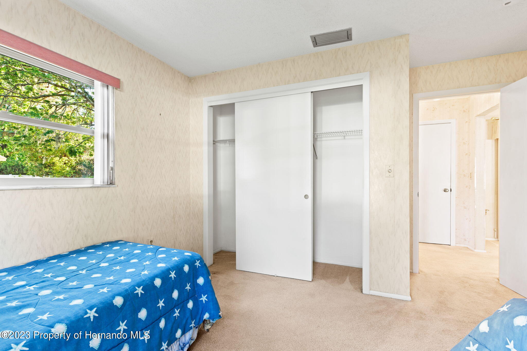 129 Candlewick Avenue Spring Hill, FL 34608 - Photo 20 of 28 24 2nd bed looking toward closet