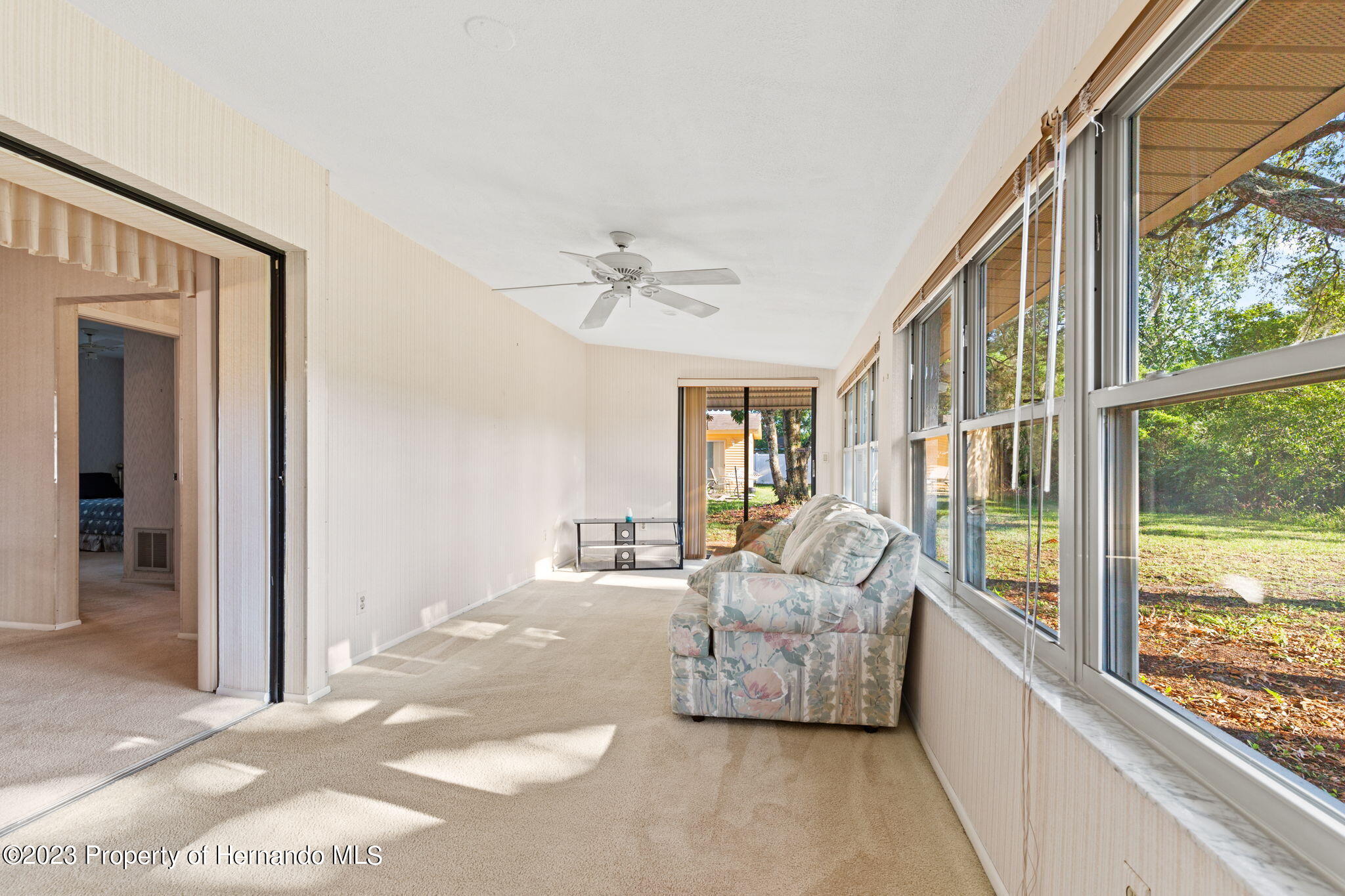 129 Candlewick Avenue Spring Hill, FL 34608 - Photo 25 of 28 29 side view of bonus room 129 candlewi