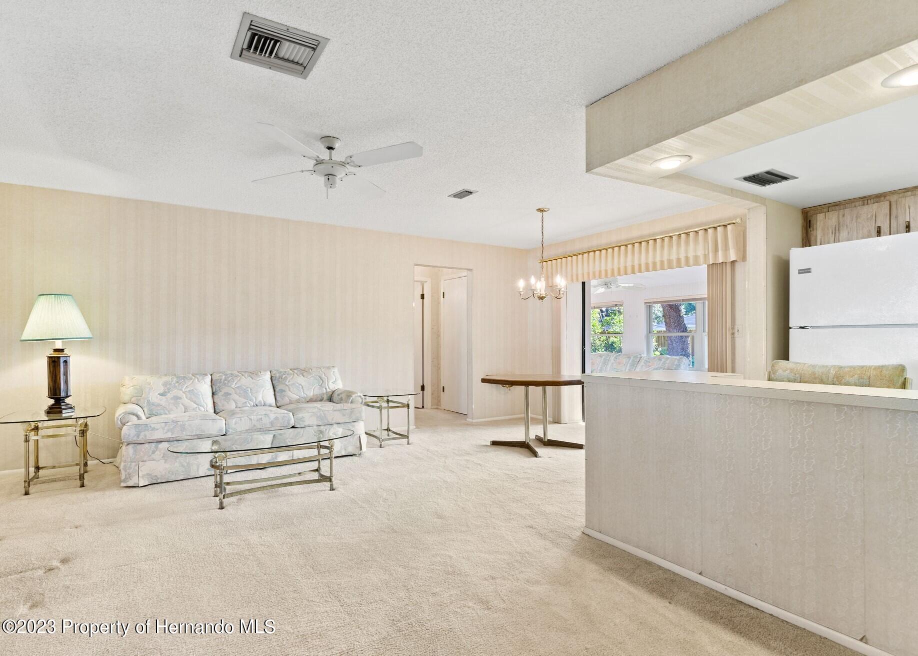 129 Candlewick Avenue Spring Hill, FL 34608 - Photo 5 of 28 7 updated living room 129