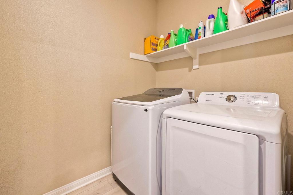 1715 Crabapple Way Oceanside, CA 92056 - Photo 17 of 31 a utility room with dryer and washer