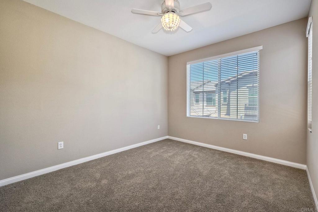 1715 Crabapple Way Oceanside, CA 92056 - Photo 19 of 31 an empty room with a window