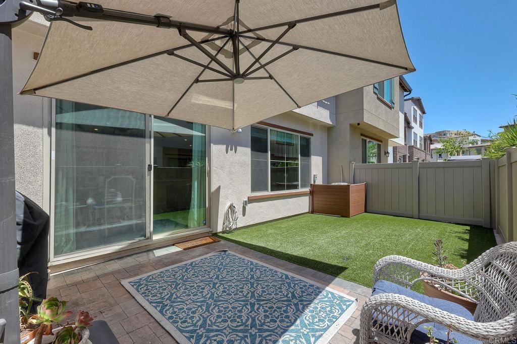 1715 Crabapple Way Oceanside, CA 92056 - Photo 24 of 31 a view of a house with backyard porch and sitting area