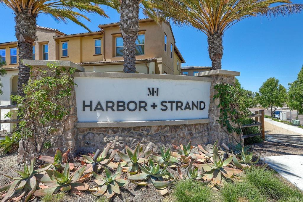 1715 Crabapple Way Oceanside, CA 92056 - Photo 30 of 31 a sign on the side of a building