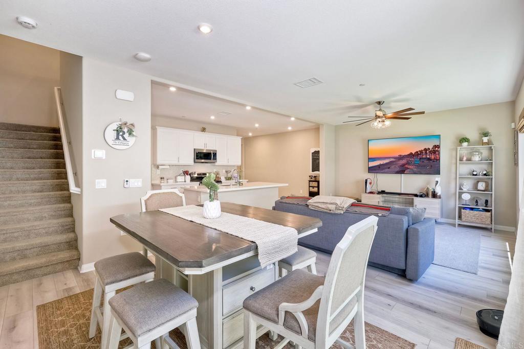 1715 Crabapple Way Oceanside, CA 92056 - Photo 8 of 31 a view of a dining room with furniture