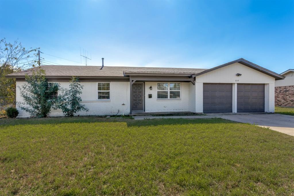 809 Michelle Drive Everman, TX 76140 - Photo 2 of 11 a view of a house with a garden