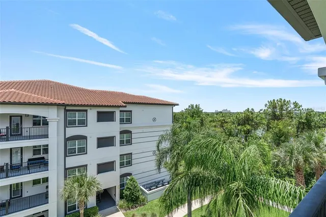 a view of a hallway with seating area