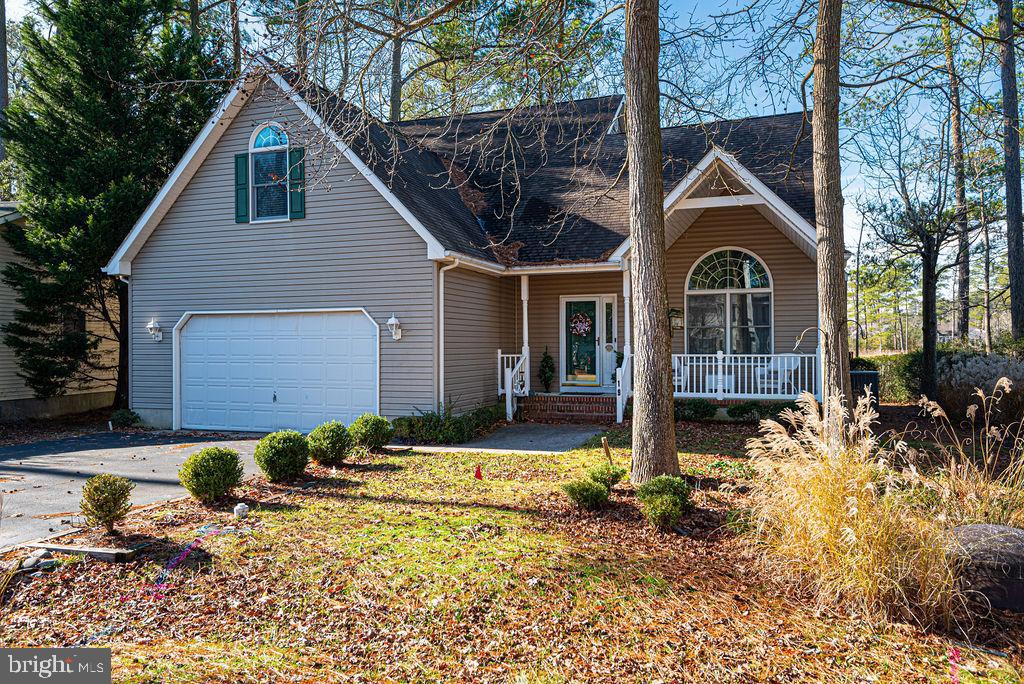 19 Mist Flower Road Ocean Pines, MD 21811 - Photo 2 of 36 a front view of a house with a yard