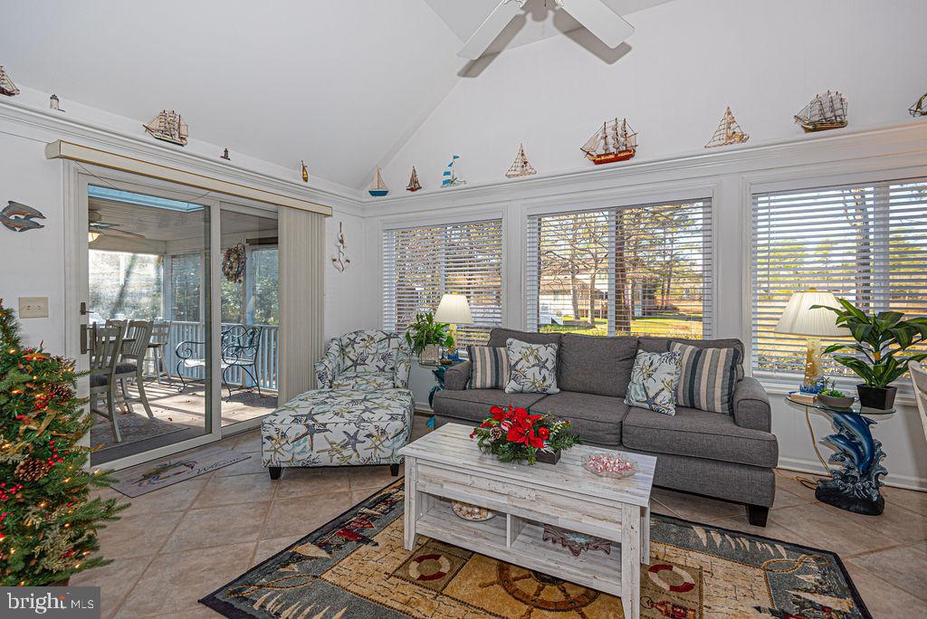 19 Mist Flower Road Ocean Pines, MD 21811 - Photo 13 of 36 a living room with furniture and a large window