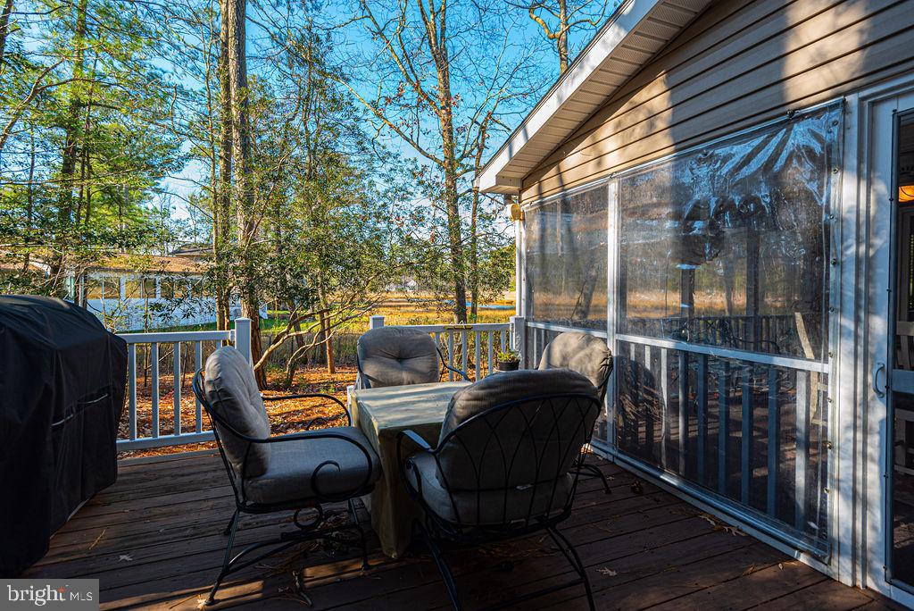 19 Mist Flower Road Ocean Pines, MD 21811 - Photo 30 of 36 a view of balcony with furniture and wooden deck