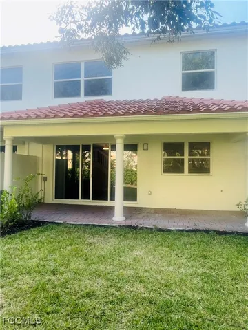 a view of a house with a garden