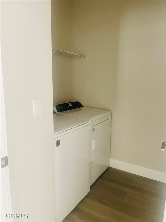 7044 Ambrosia Lane, Unit 103 Naples, FL 34119 - Photo 10 of 20 a utility room with dryer and washer