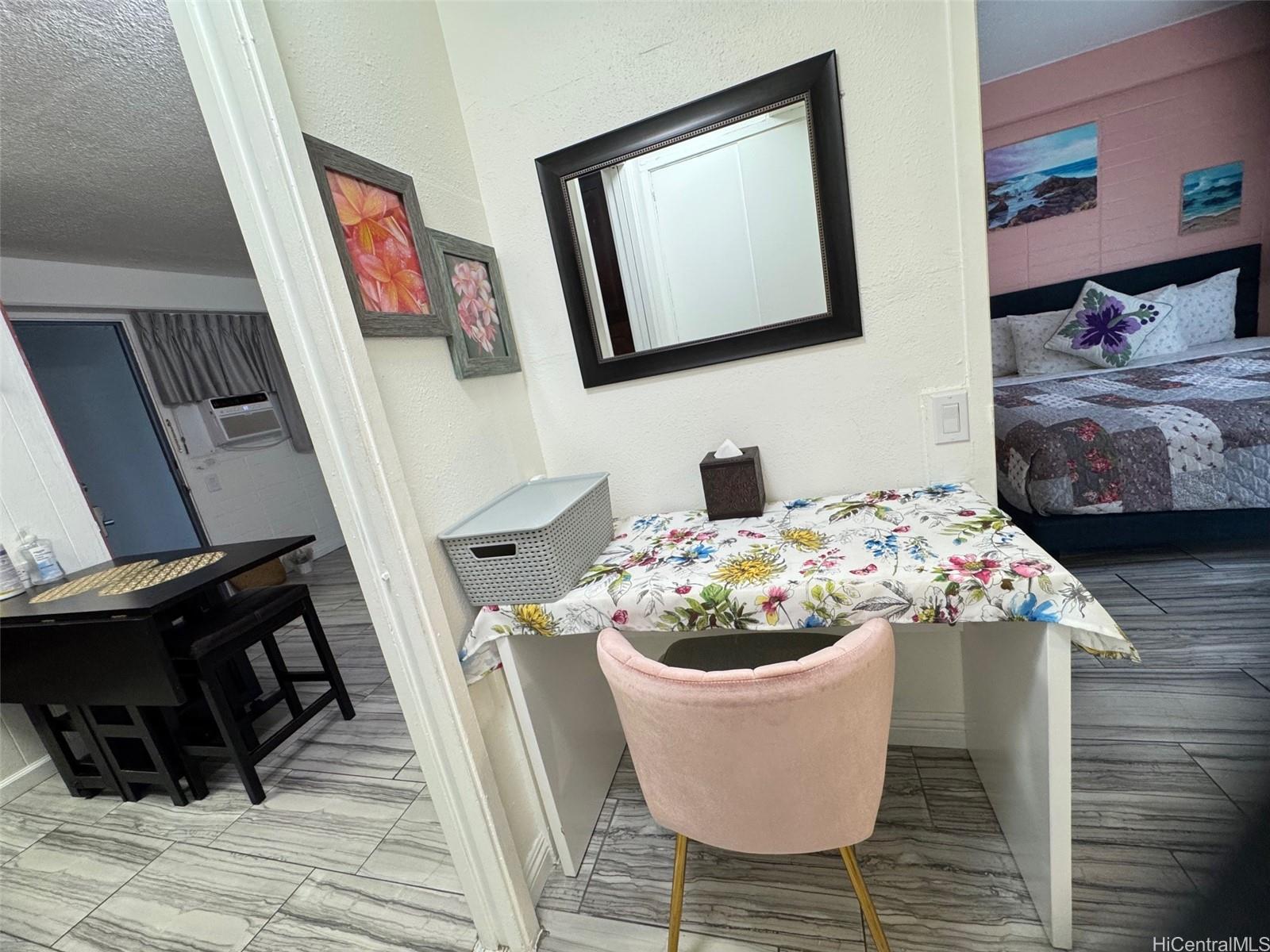 417 Nohonani Street, Unit 410 Honolulu, HI 96815 - Photo 15 of 20 a dining room with furniture and wooden floor