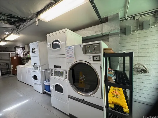 a utility room with dryer and washer