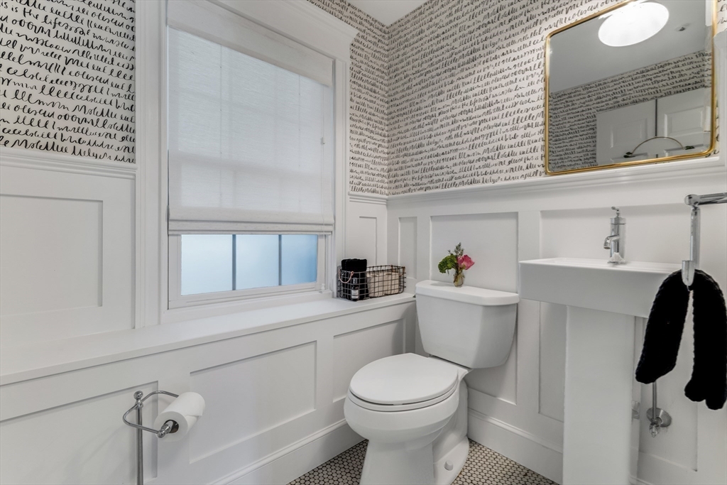 85 Old Farm Road Milton, MA 02186 - Photo 25 of 42 a bathroom with a toilet sink and mirror