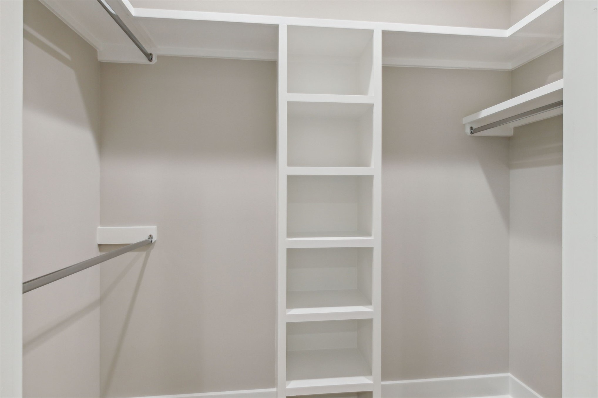 96050 Captains Pointe Road Yulee, FL 32097 - Photo 22 of 36 a view of walk in closet with empty racks