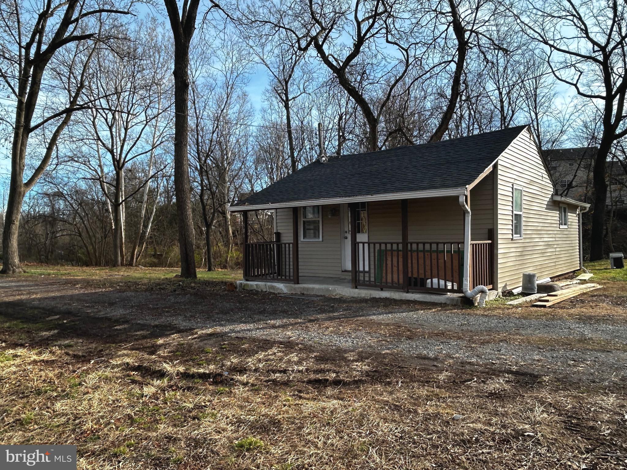 448 Plum Alley Spring City, PA 19475 - Photo 3 of 15 a front view of a house with a yard and trees