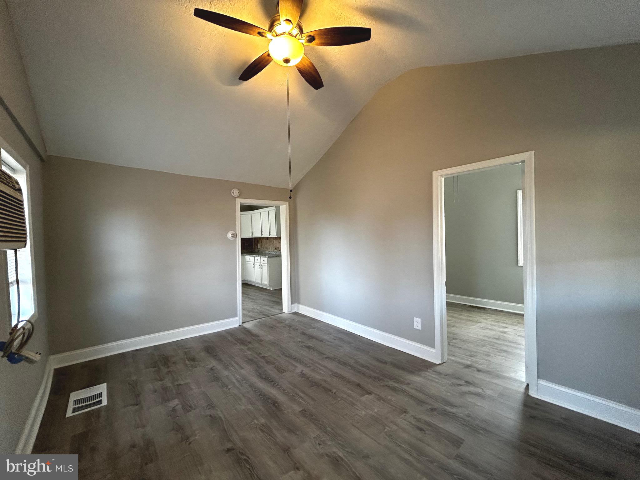 448 Plum Alley Spring City, PA 19475 - Photo 5 of 15 an empty room with wooden floor closet and windows