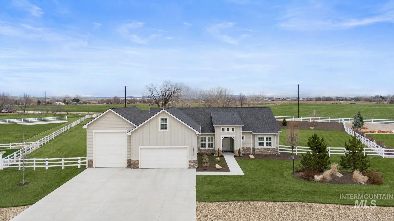 24696 Regal Road Middleton, ID 83644 - Photo 21 of 24 Contemporary single-story residence with a light-toned vertical and horizontal siding and stone accents