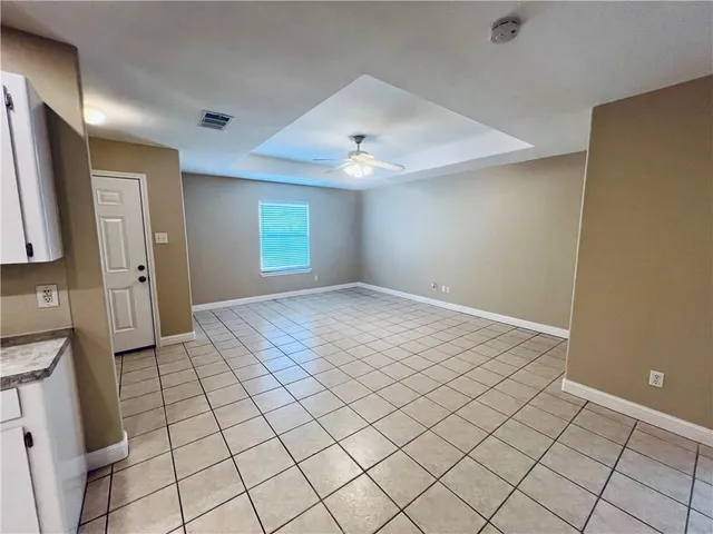 a view of an empty room and window